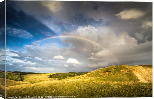 Rainbow Over Southerndown Canvas Print by Heidi Stewart