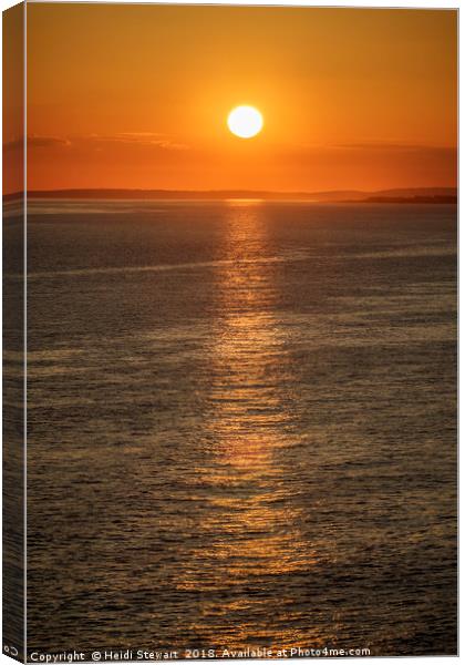 Setting Sun at Nash Point, south Wales Canvas Print by Heidi Stewart