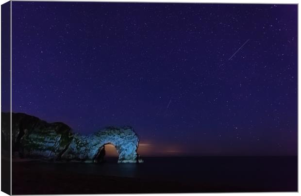 Perseids over Durdle Door Canvas Print by Anthony Simpson