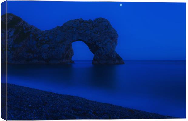 Moon over Durdle Door Canvas Print by Anthony Simpson