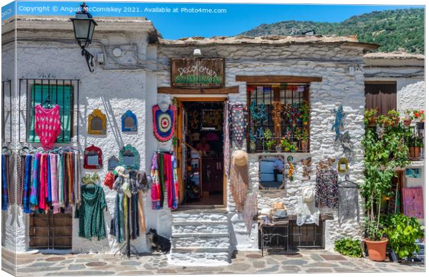 Craft Shop in Pampaneira in Andalusia, Spain Canvas Print by Angus McComiskey