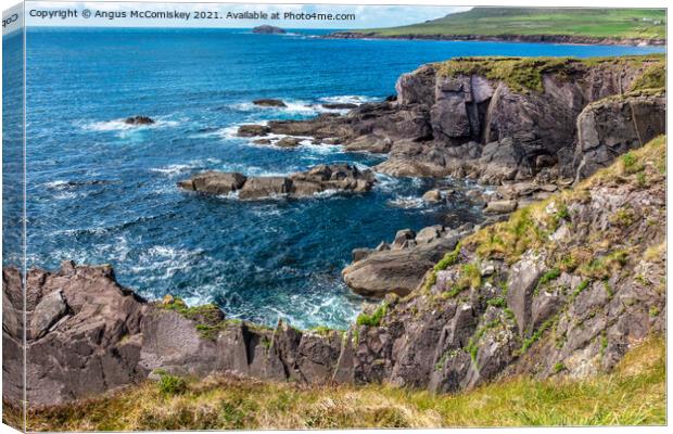 Coastline at Feohanagh on the Dingle Peninsula Canvas Print by Angus McComiskey