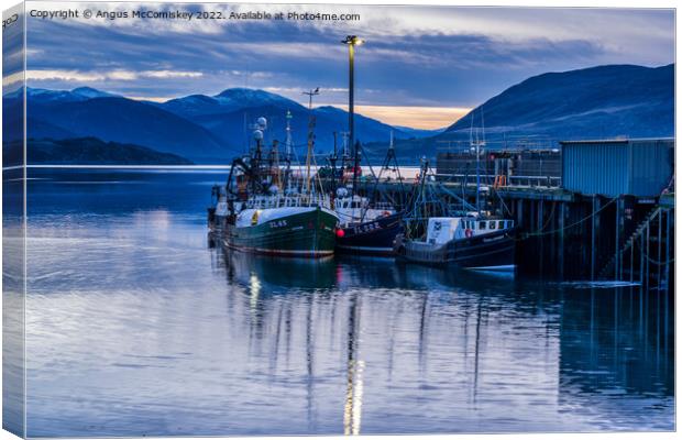 Fishing boats in Ullapool harbour at daybreak Canvas Print by Angus McComiskey