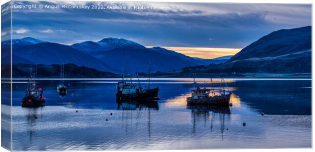 Fishing boats moored on Loch Broom at daybreak Canvas Print by Angus McComiskey