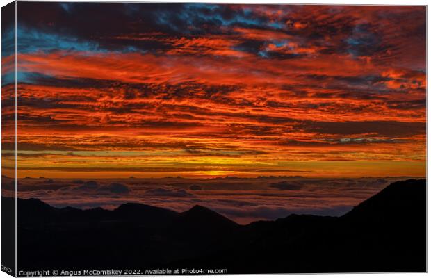 Sunrise from summit of Haleakala on Maui, Hawaii Canvas Print by Angus McComiskey