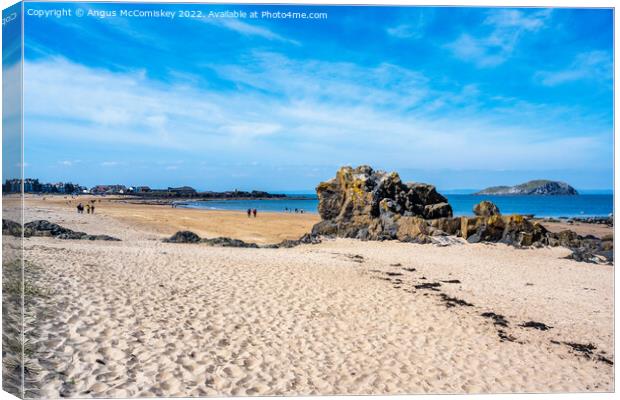 Rocky outcrop on Milsey Bay beach North Berwick Canvas Print by Angus McComiskey