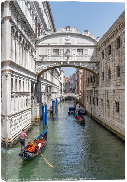 Gondolas under the Bridge of Sighs in Venice Canvas Print by Angus McComiskey