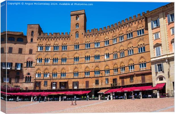 Medieval buildings in Piazza del Campo in Siena Canvas Print by Angus McComiskey