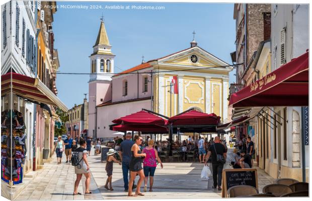 Old town of Porec on Istrian Peninsula of Croatia Canvas Print by Angus McComiskey