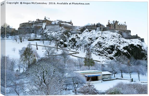 Edinburgh Castle and Ross Bandstand in snow Canvas Print by Angus McComiskey