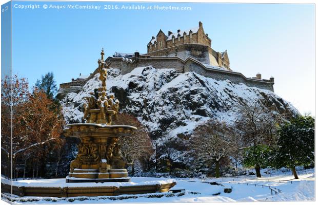 Edinburgh Castle and Ross Fountain in snow Canvas Print by Angus McComiskey