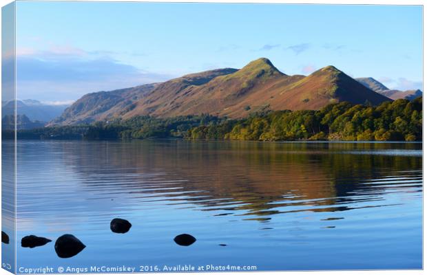 Derwentwater at daybreak Canvas Print by Angus McComiskey