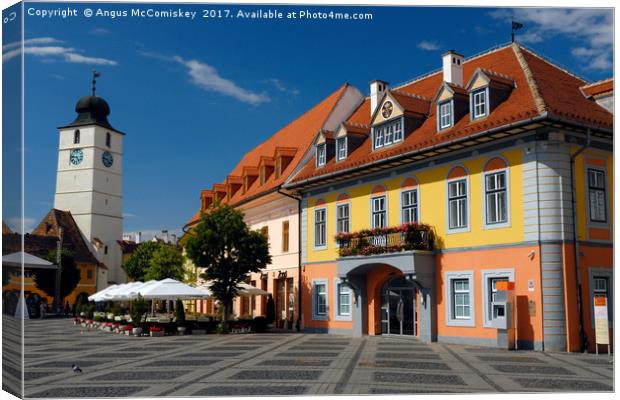 Colourful renovated merchants houses in Sibiu Canvas Print by Angus McComiskey