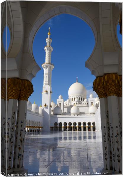 Through arch to Inner Courtyard of Grand Mosque Canvas Print by Angus McComiskey
