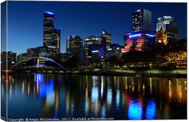 Melbourne Northbank skyline at dusk Canvas Print by Angus McComiskey