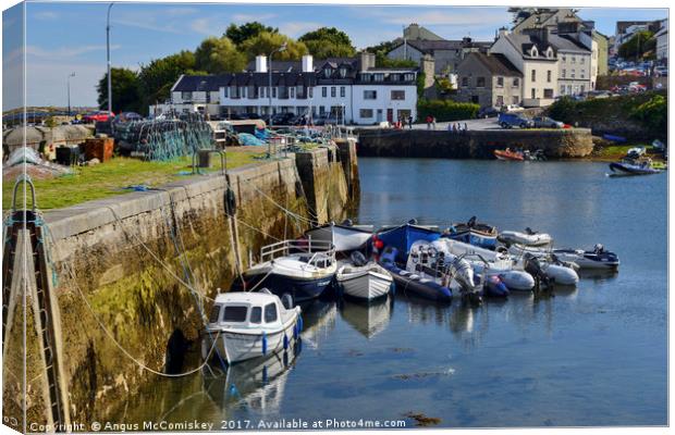 Boats in Roundstone harbour, County Galway Canvas Print by Angus McComiskey