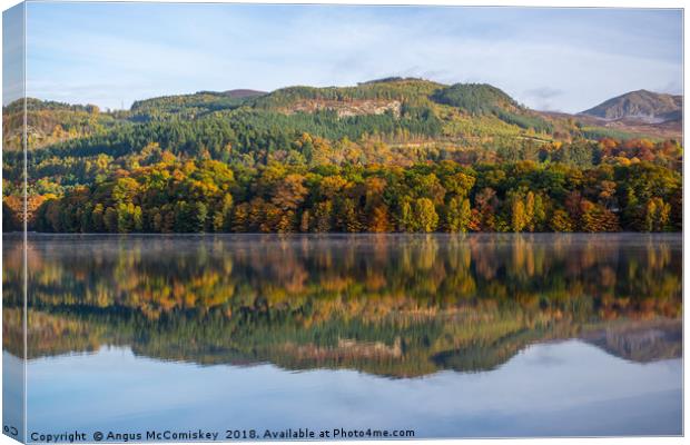 Early morning mist rising off Loch Faskally Canvas Print by Angus McComiskey