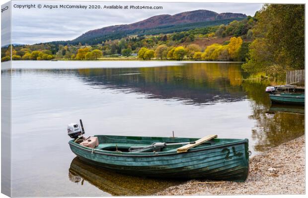 Beached boat on Lake of Menteith Canvas Print by Angus McComiskey