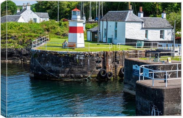 Sea lock and lighthouse on Crinan Canal, Scotland Canvas Print by Angus McComiskey