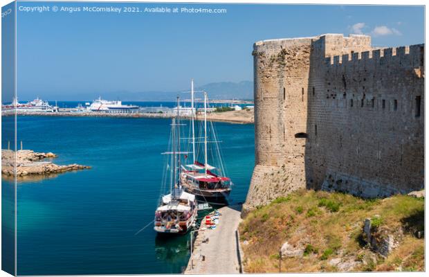 Boats moored next Kyrenia Castle, Northern Cyprus Canvas Print by Angus McComiskey