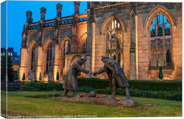 Christmas truce football statue Liverpool by night Canvas Print by Angus McComiskey
