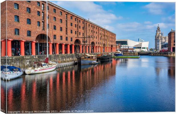 Boats moored in Royal Albert Dock, Liverpool Canvas Print by Angus McComiskey