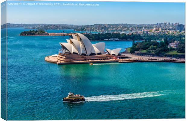 Sydney Opera House and ferry Canvas Print by Angus McComiskey