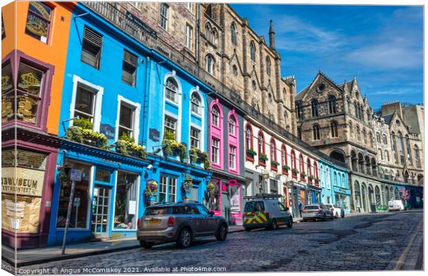 Colourful shopfronts on Victoria Street, Edinburgh Canvas Print by Angus McComiskey