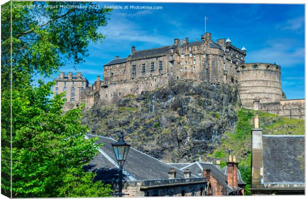 Across the rooftops to Edinburgh Castle Canvas Print by Angus McComiskey