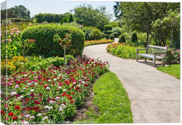 Winding walkway through beautiful and colorful gar Canvas Print by Jamie Pham