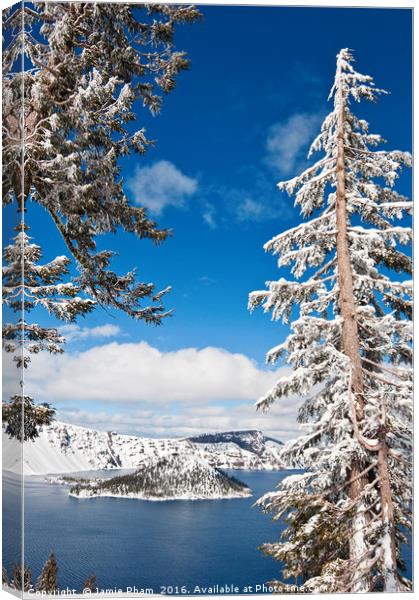 Beautiful view of Crater Lake covered in snow in t Canvas Print by Jamie Pham