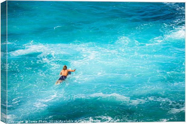 Surfers at the famous Hookipa Beach in the North s Canvas Print by Jamie Pham
