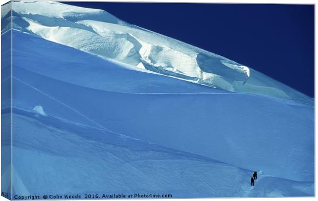 First light and climbers on Mont Blanc du Tacul Canvas Print by Colin Woods