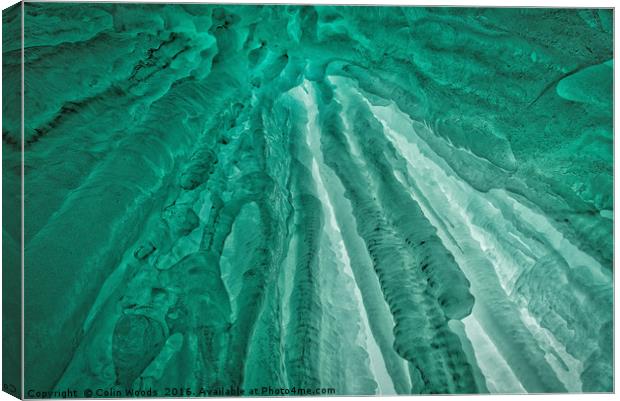 Looking up at gorgeous green icicles Canvas Print by Colin Woods