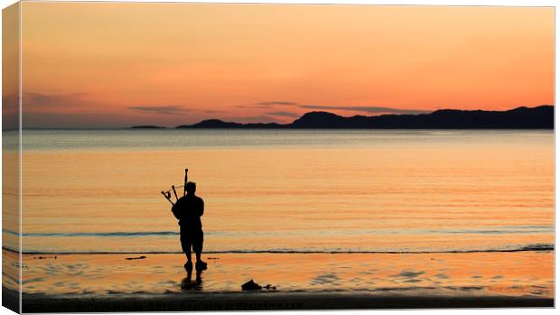 Piper on the beach at Arisaig, Scotland Canvas Print by Colin Woods