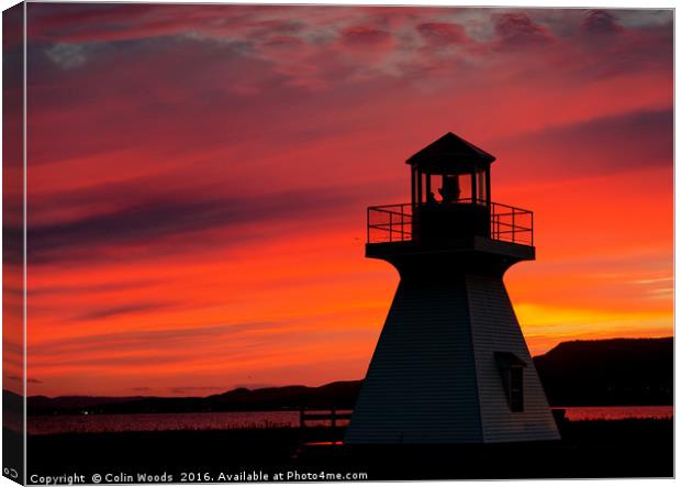 Lighthouse at Sunset Canvas Print by Colin Woods