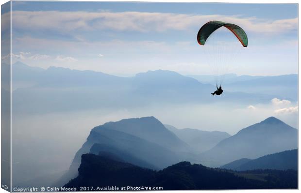 Parapenting in the French Alps Canvas Print by Colin Woods