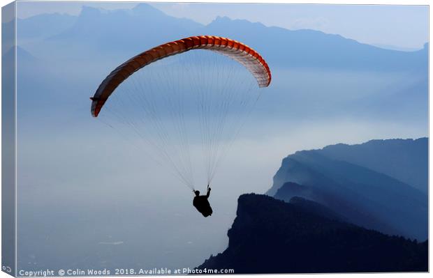 Parapente in the French Alps Canvas Print by Colin Woods