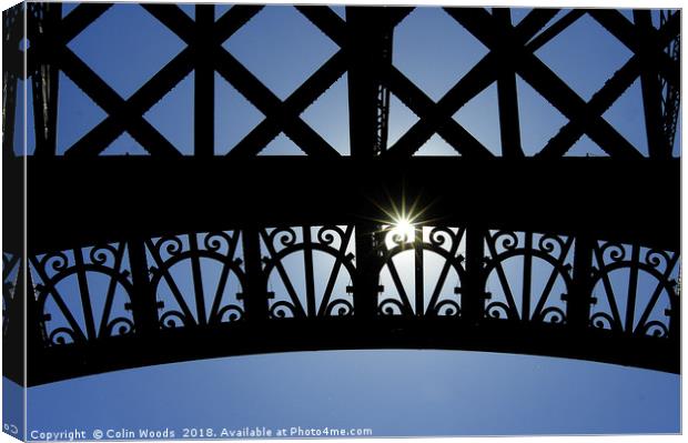 Sunstar and the Eiffel Tower Canvas Print by Colin Woods