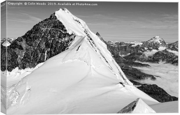 Climbers high in the Swiss Alps, on the traverse o Canvas Print by Colin Woods