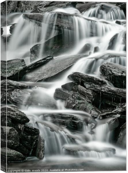 Detail of waterfalls in a stream taken as a long time exposure Canvas Print by Colin Woods