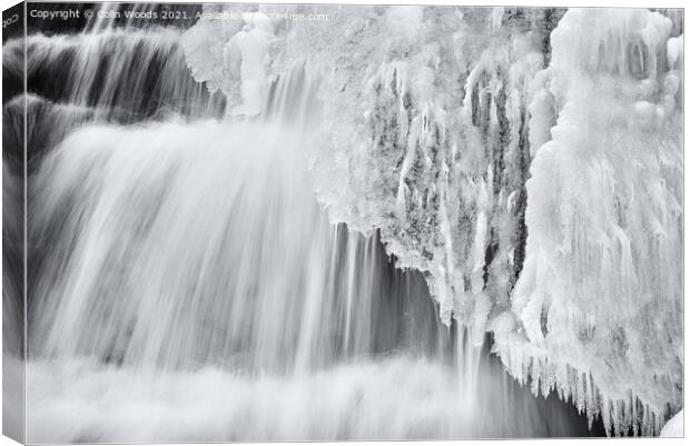 Icicles forming in a waterfall in Quebec, Canada Canvas Print by Colin Woods