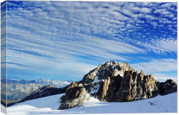 Outdoor mountainDramatic clouds over the Aiguille de Tour in the French Alps as seen from high on the Glacier du Tour, Chamonix, France Canvas Print by Colin Woods