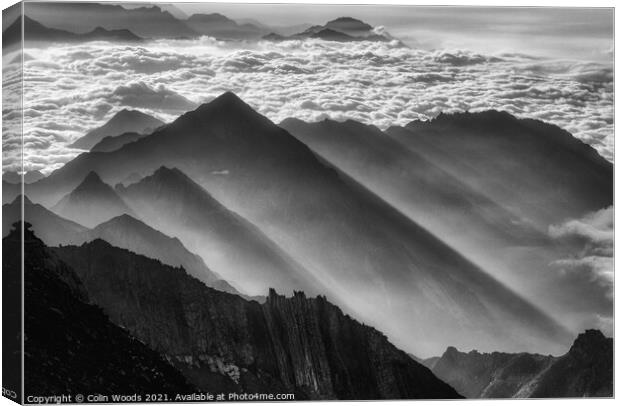 Sunbeams and Morning Mist Canvas Print by Colin Woods