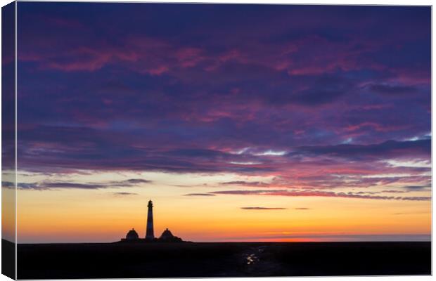 Lighthouse Westerheversand at Sunset Canvas Print by Arterra 