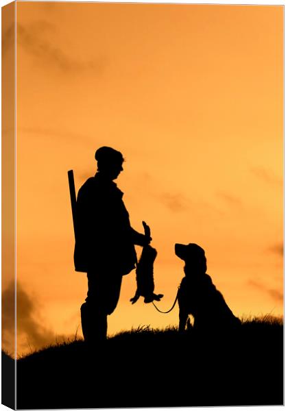 Hunter with Dog at Sunset Canvas Print by Arterra 