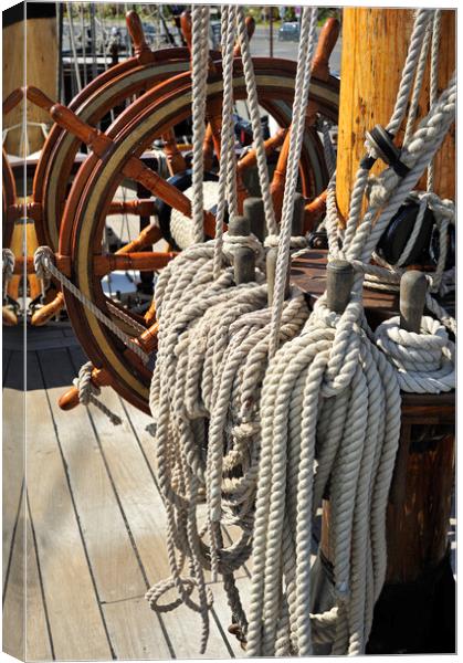 Frigate's Steering Wheel and Ropes Canvas Print by Arterra 