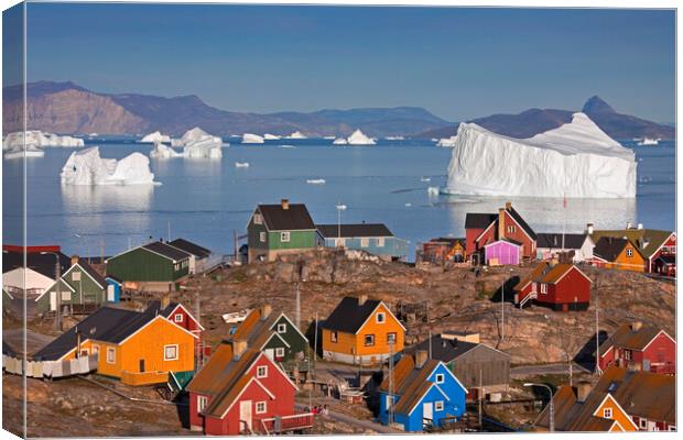Uummannaq Village and Giant Iceberg, Greenland Canvas Print by Arterra 
