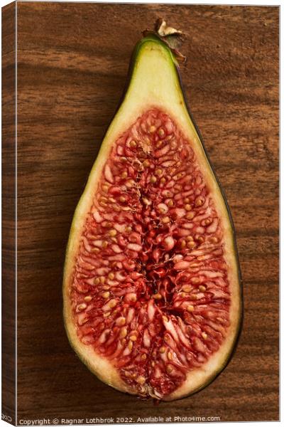 Figs on a wooden board Canvas Print by Ragnar Lothbrok