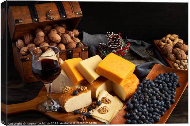 Variety of cheese on a wooden board Canvas Print by Ragnar Lothbrok